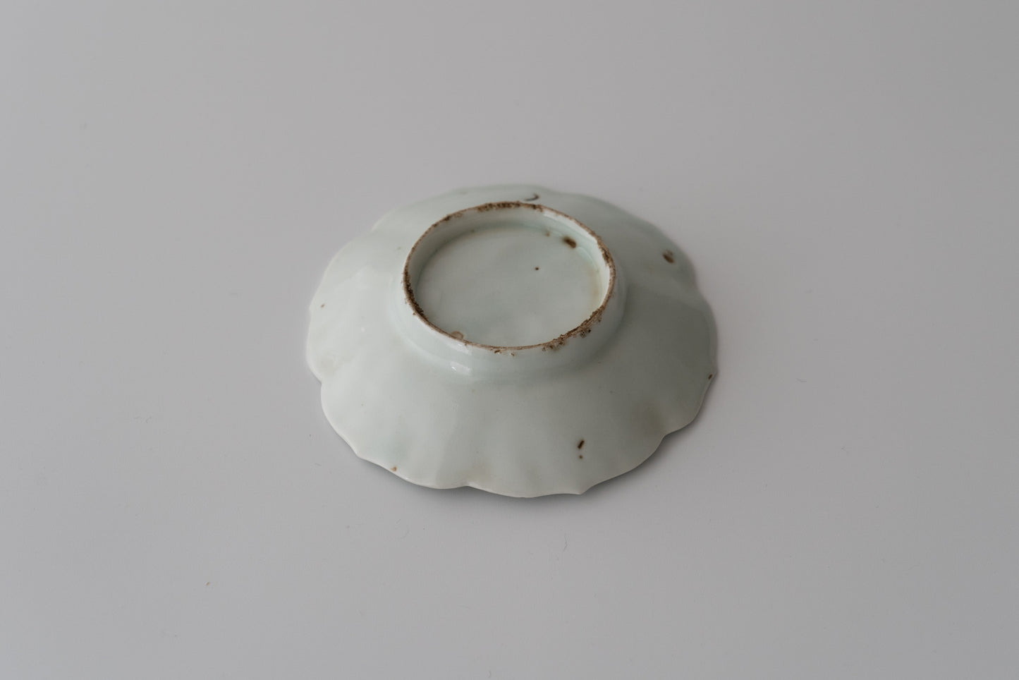 A set of five small dishes with pomegranate design, Early Imari ware