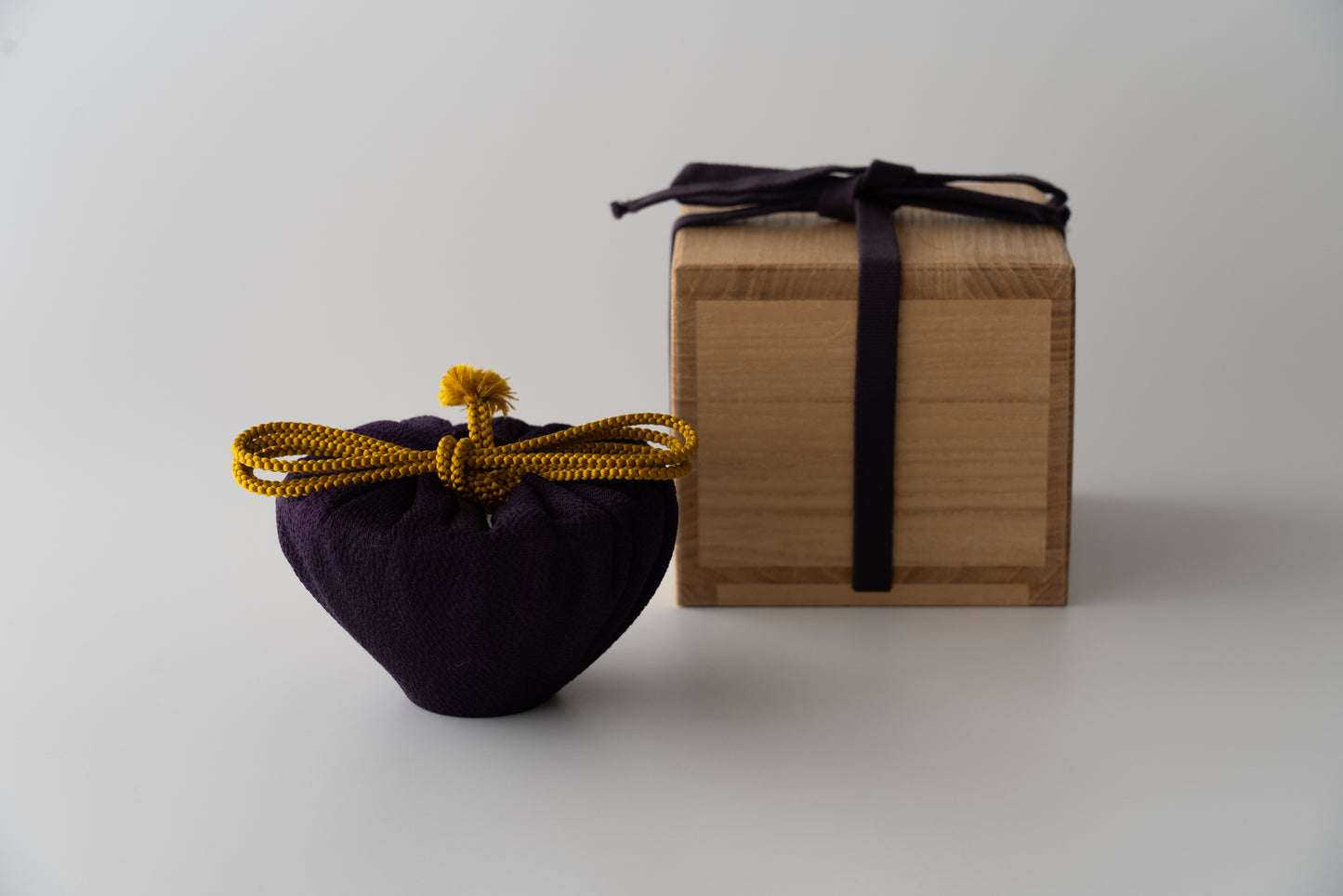 Kakiemon white porcelain bowl with embossed plum blossom design