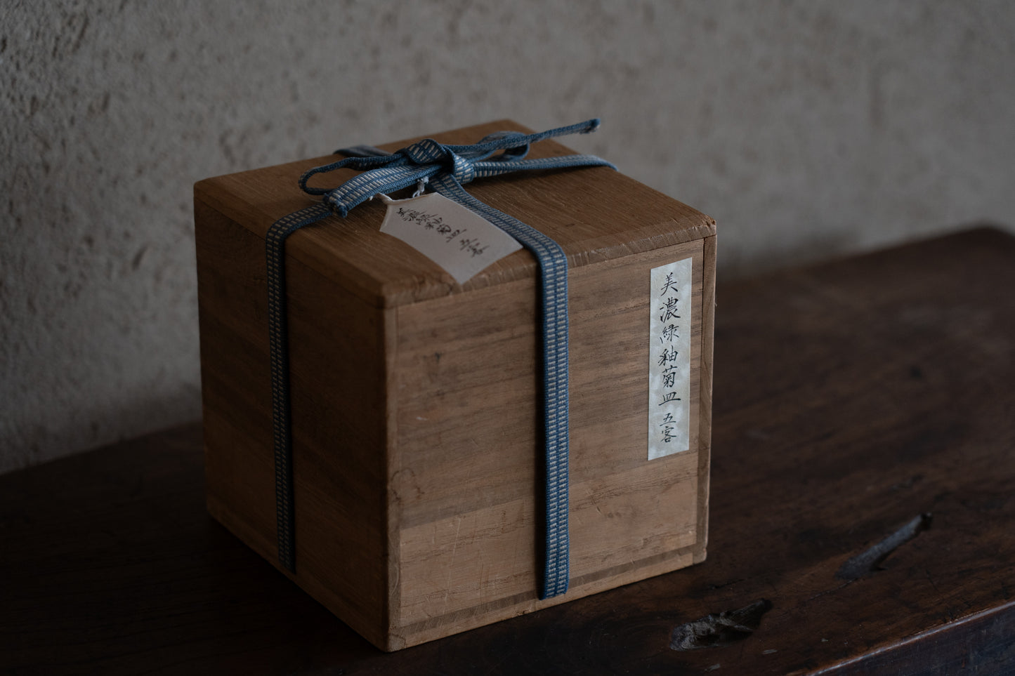 A set of five Oribe green glazed dishes in chrysanthemum design