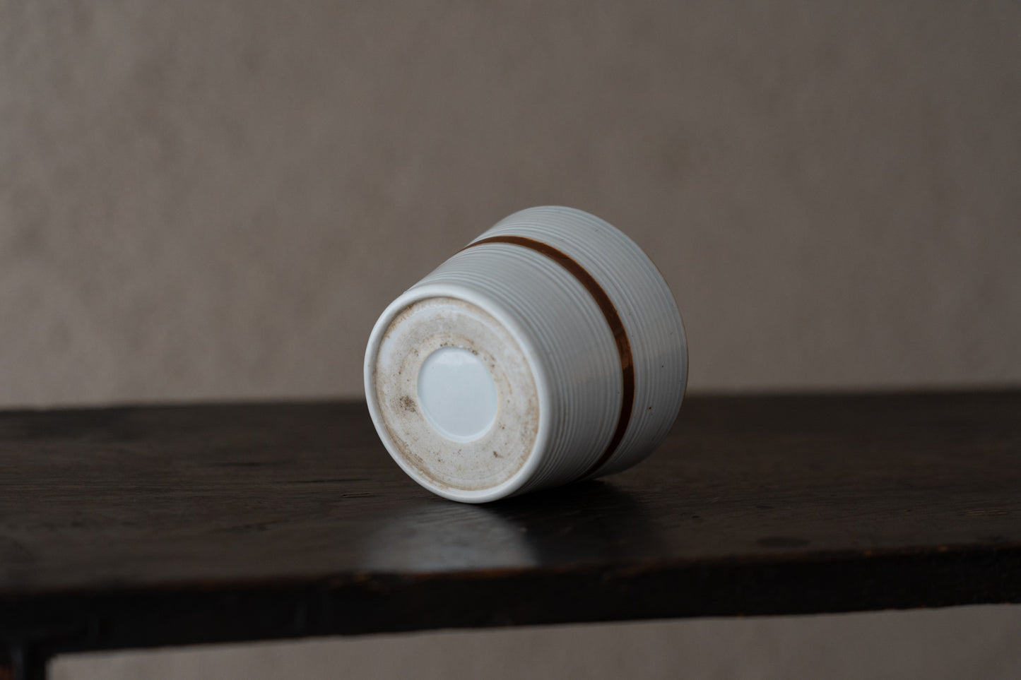 Old Imari sake cup with rust glazed line pattern