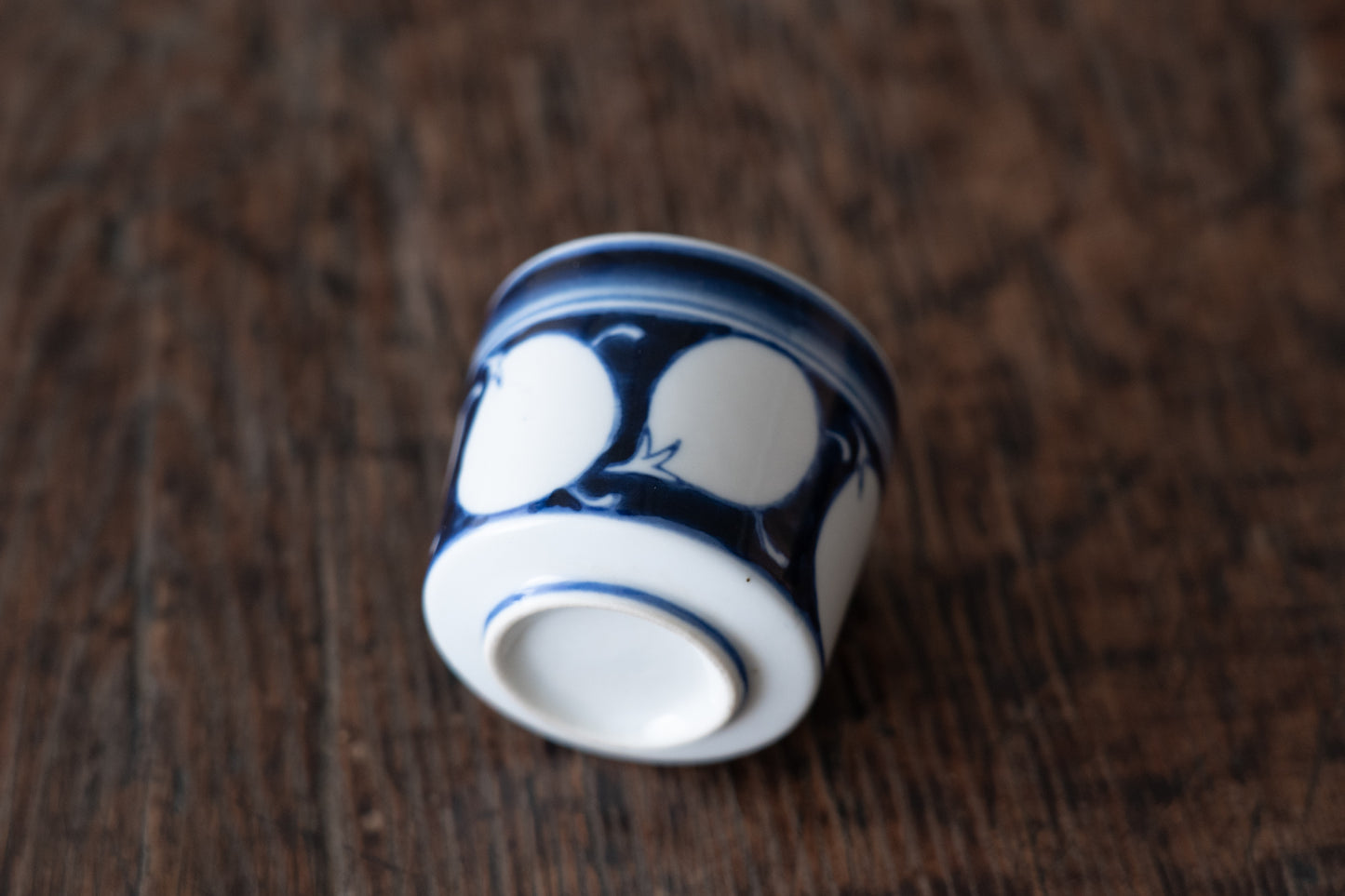Old Imari sake cup with eggplant design