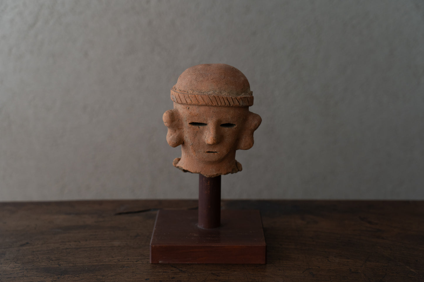 Haniwa male figure wearing a hat