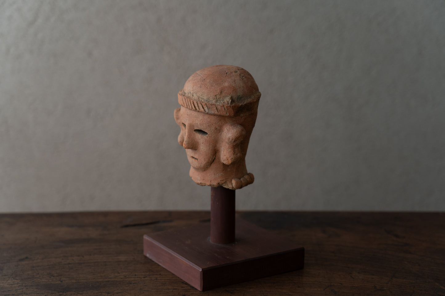 Haniwa male figure wearing a hat