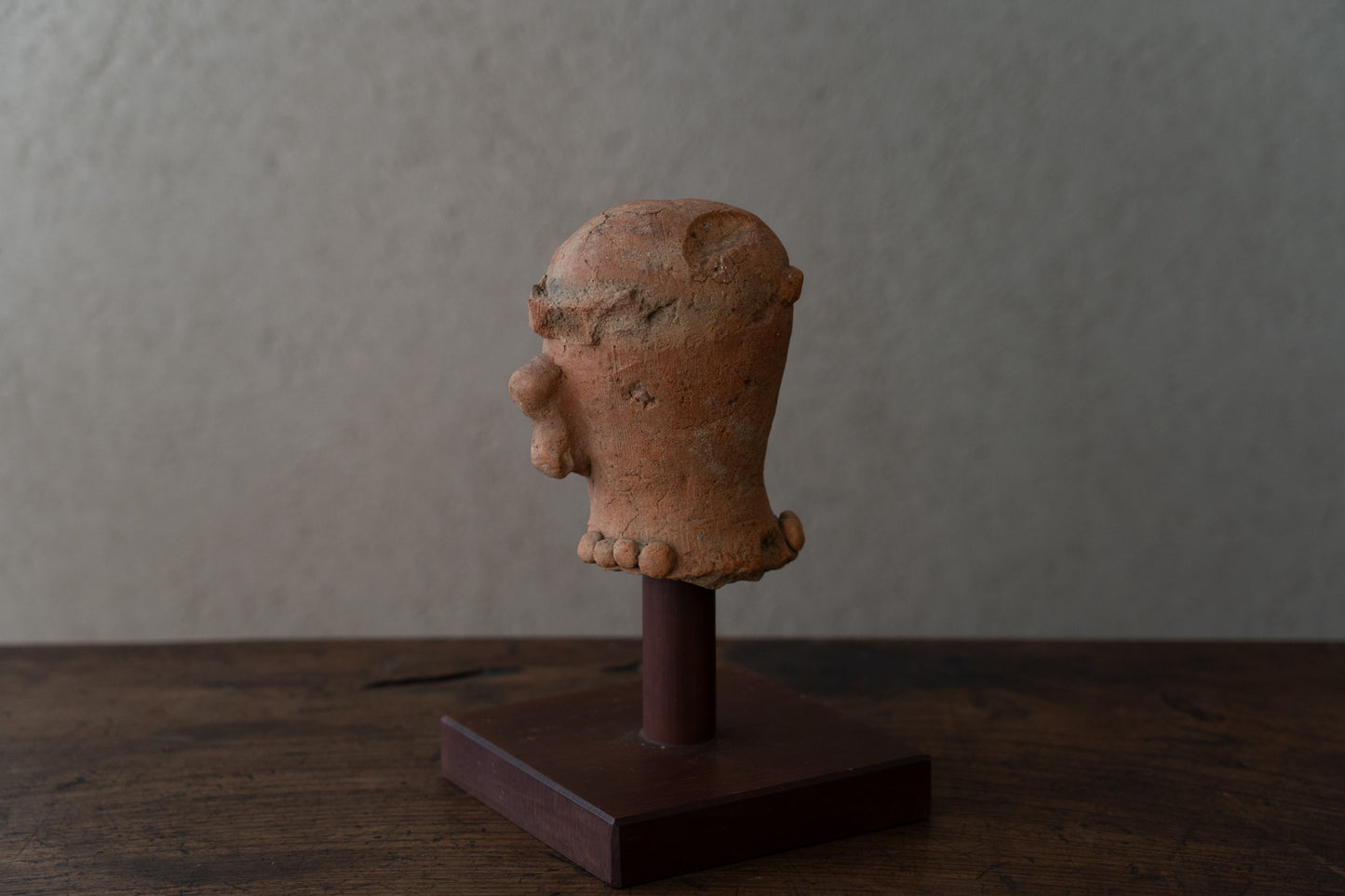 Haniwa male figure wearing a hat