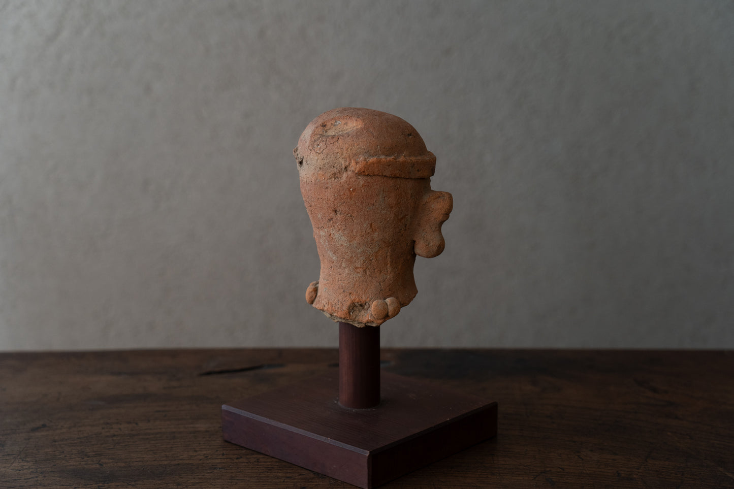 Haniwa male figure wearing a hat
