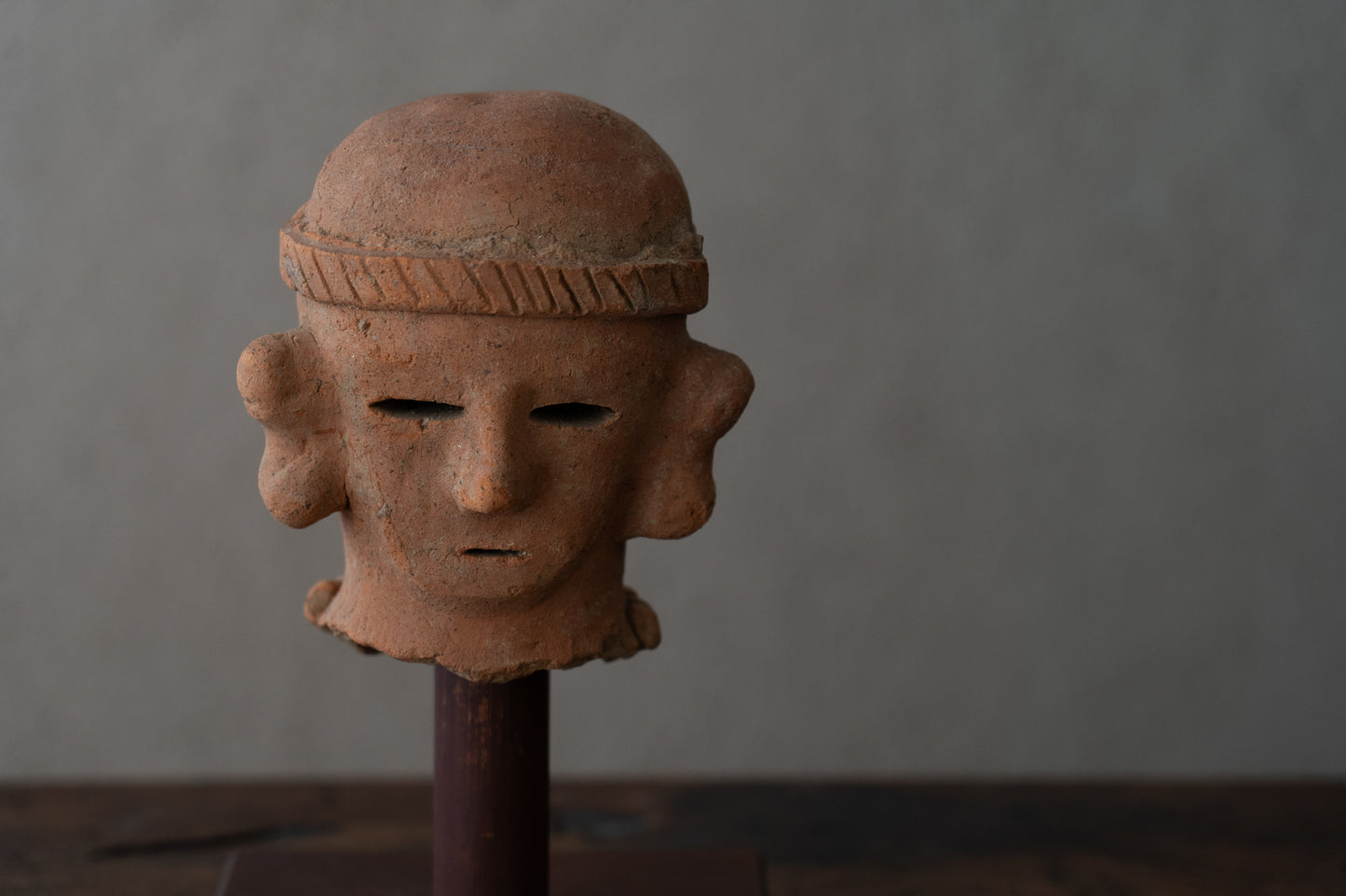 Haniwa male figure wearing a hat