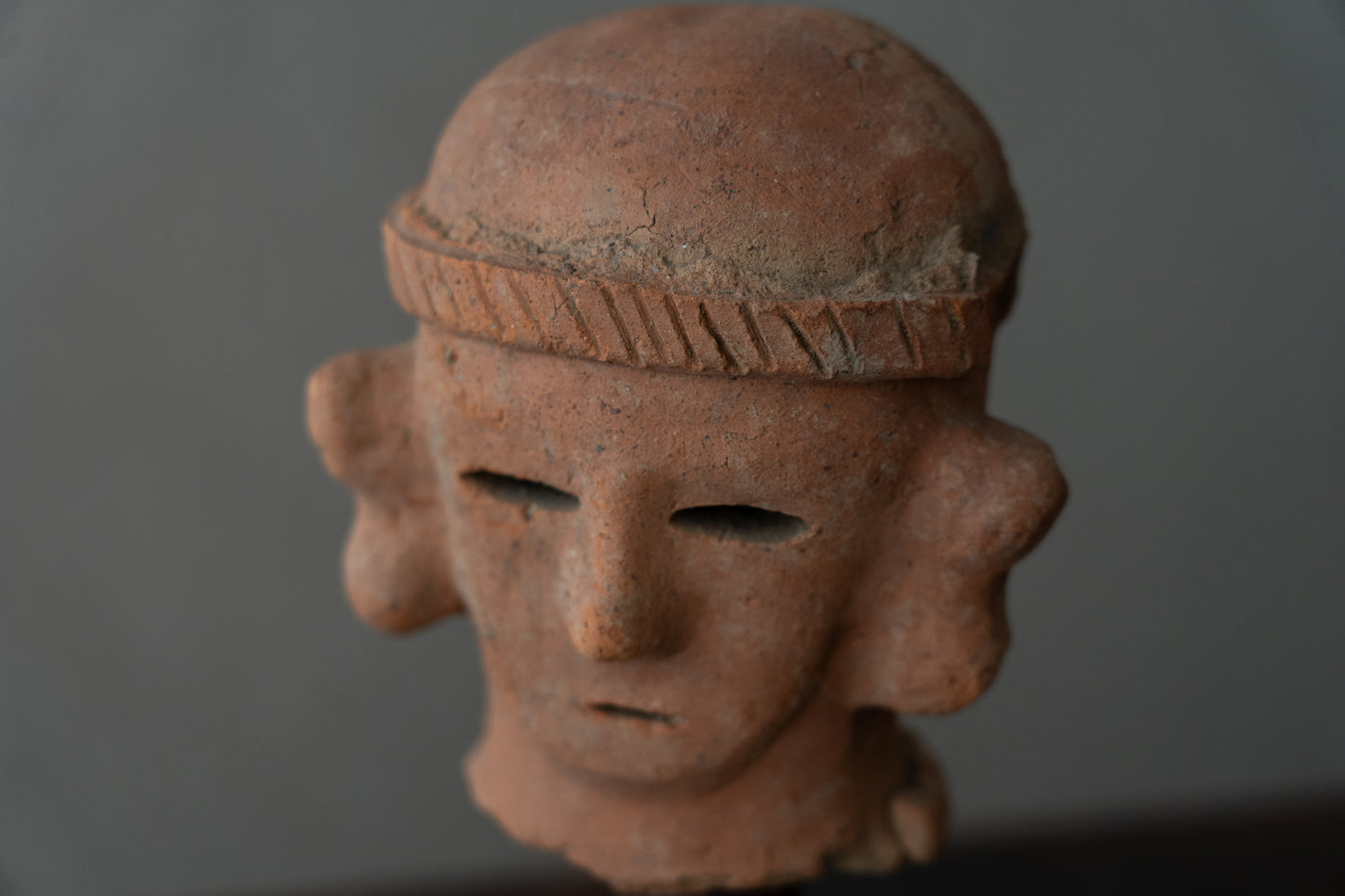 Haniwa male figure wearing a hat