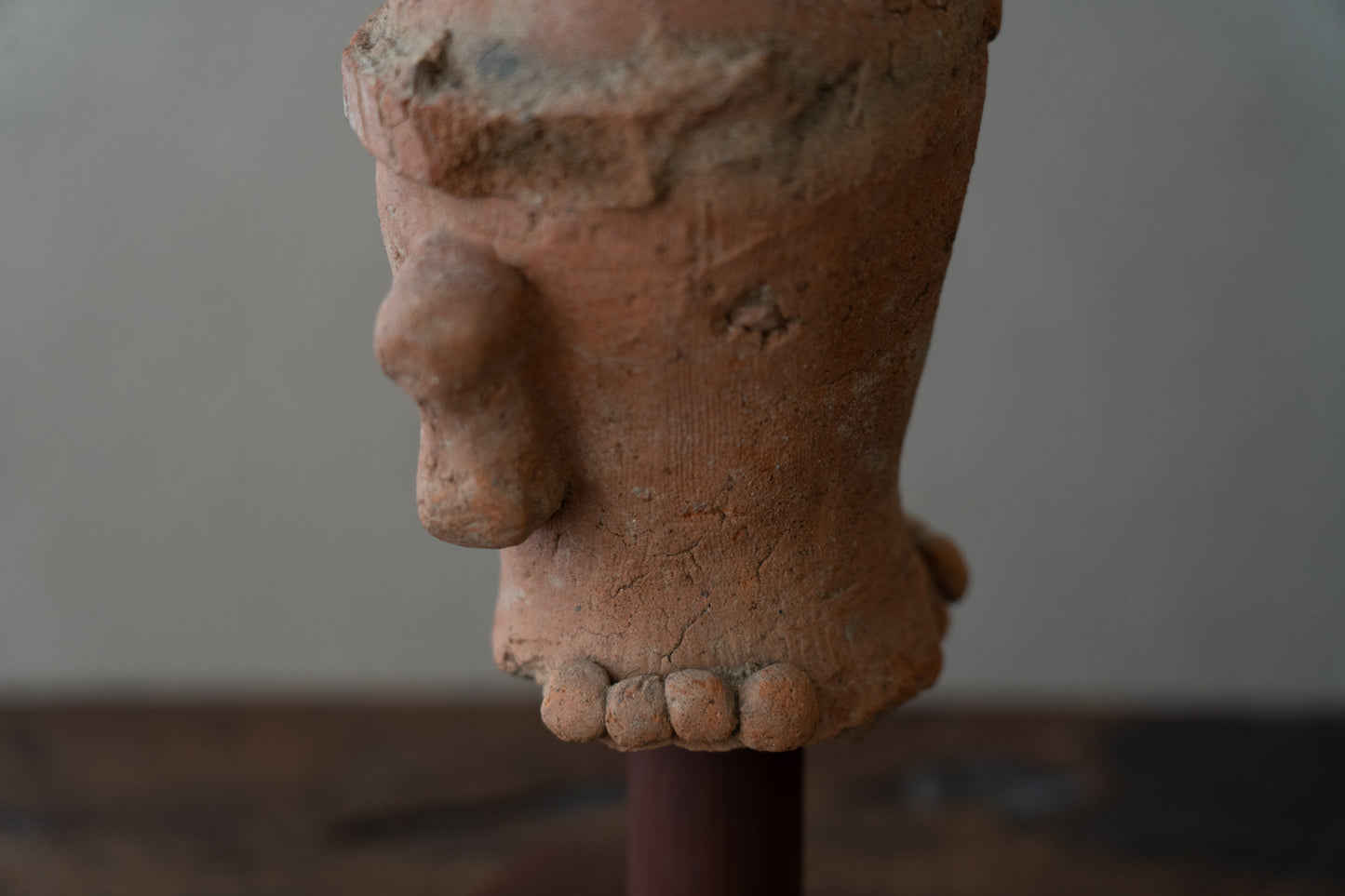 Haniwa male figure wearing a hat