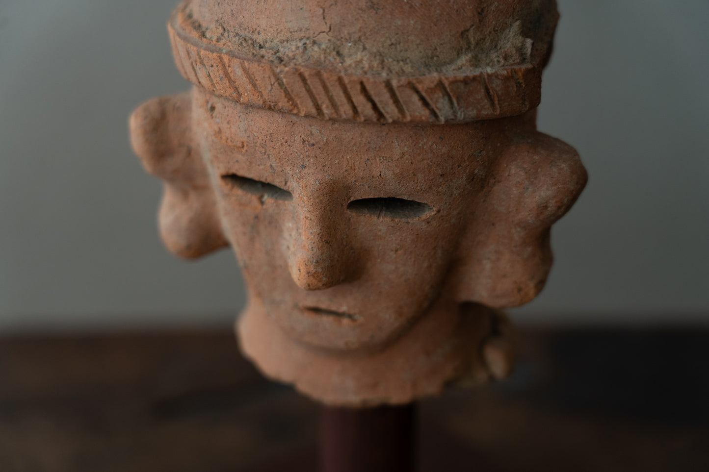 Haniwa male figure wearing a hat
