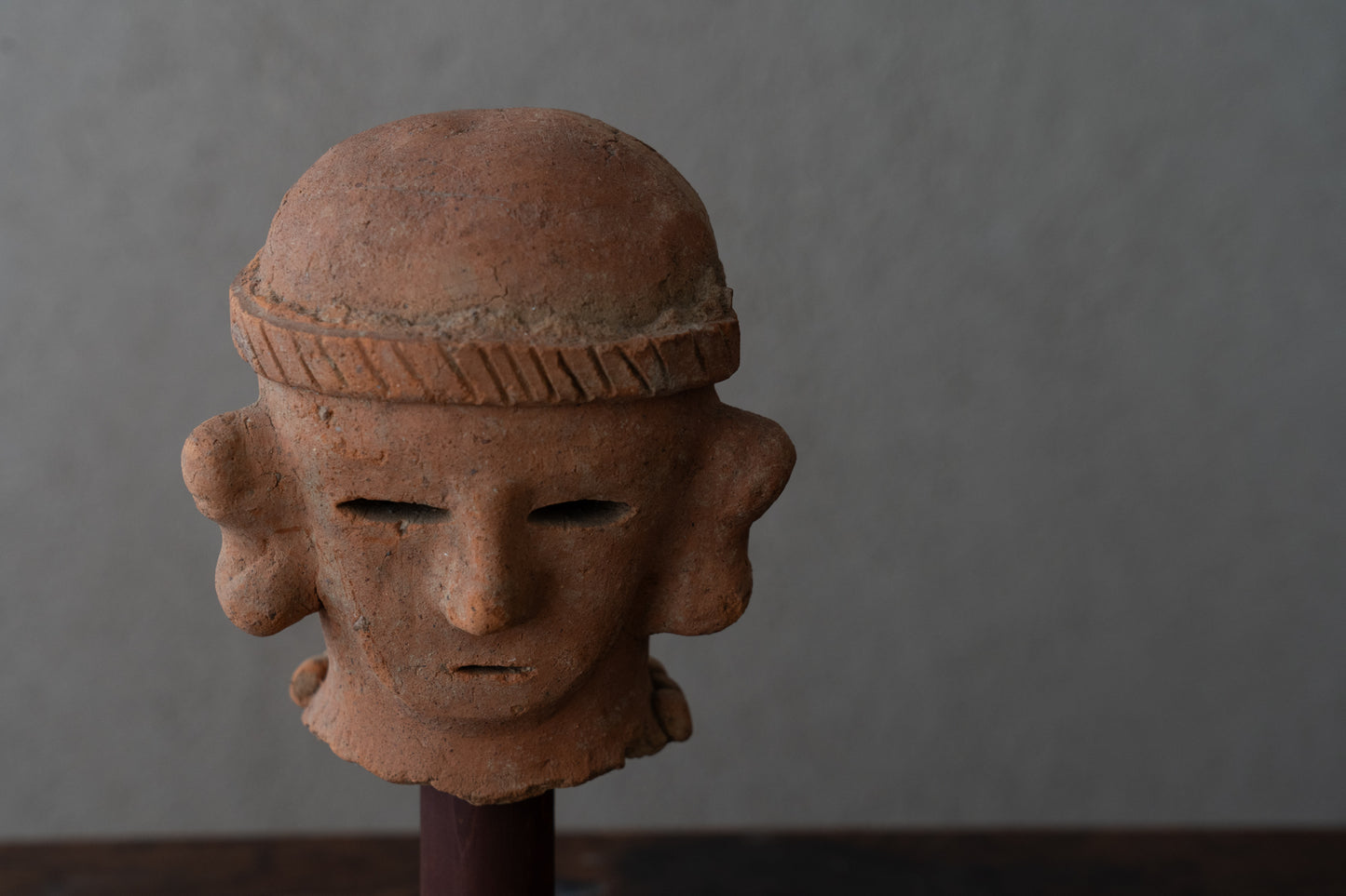 Haniwa male figure wearing a hat