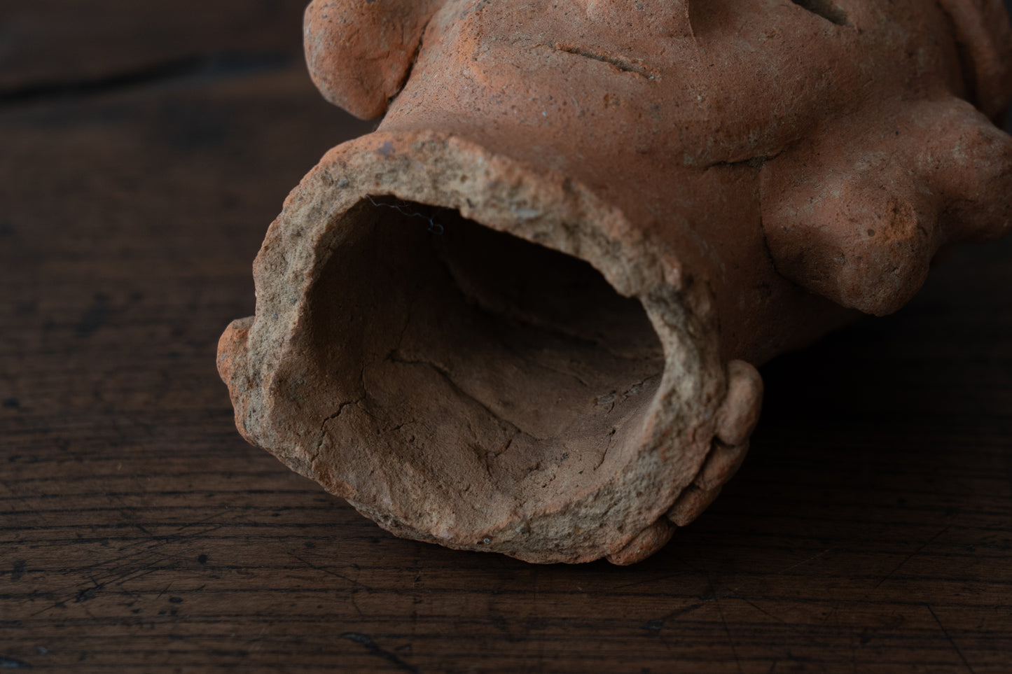 Haniwa male figure wearing a hat