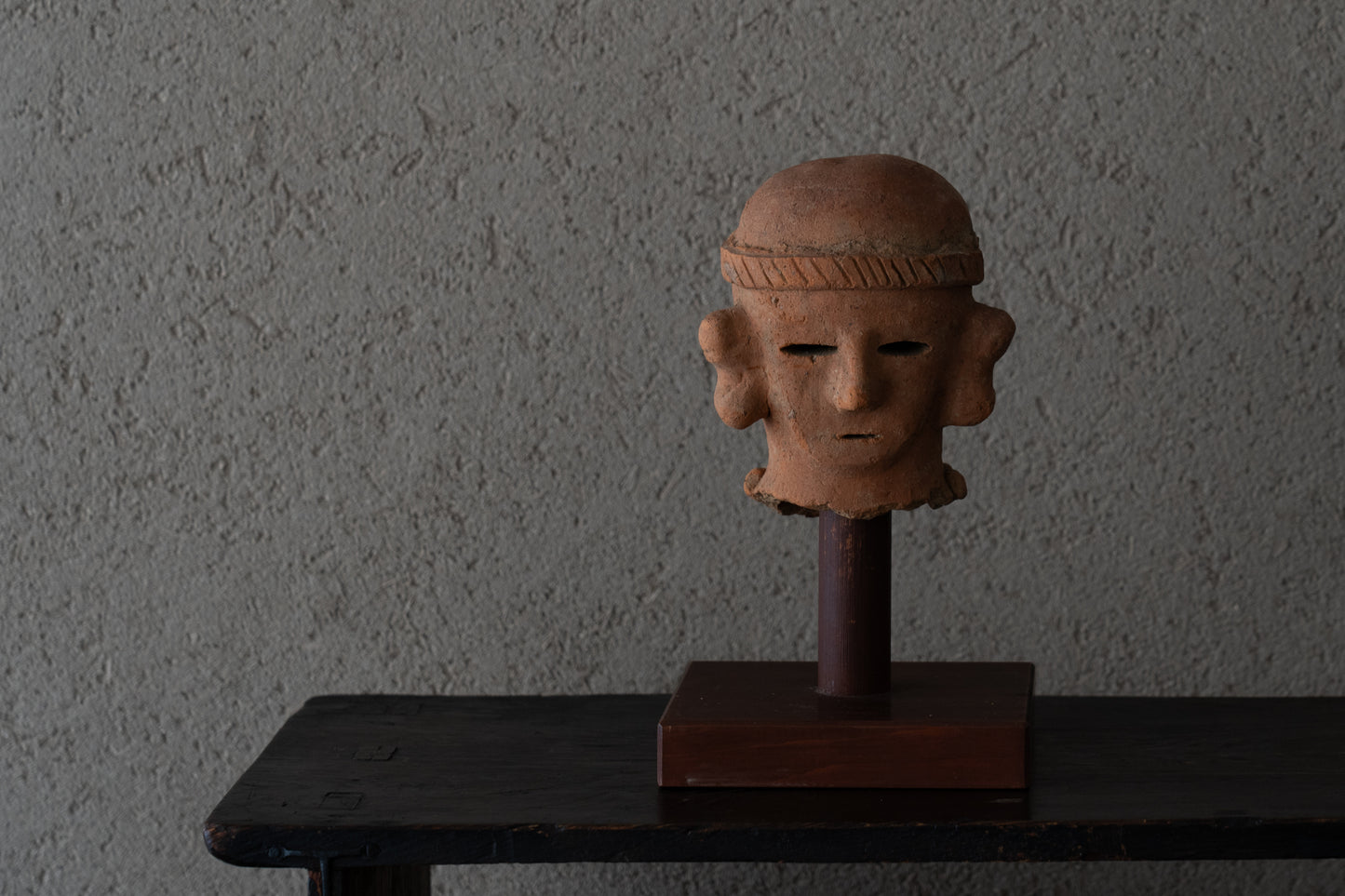 Haniwa male figure wearing a hat