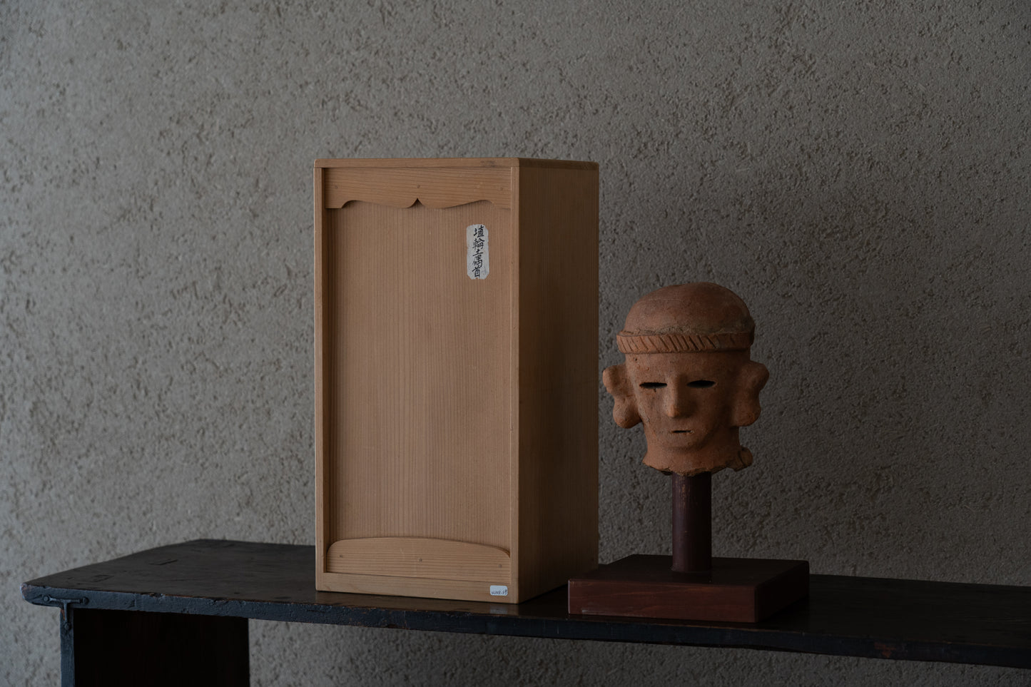 Haniwa male figure wearing a hat