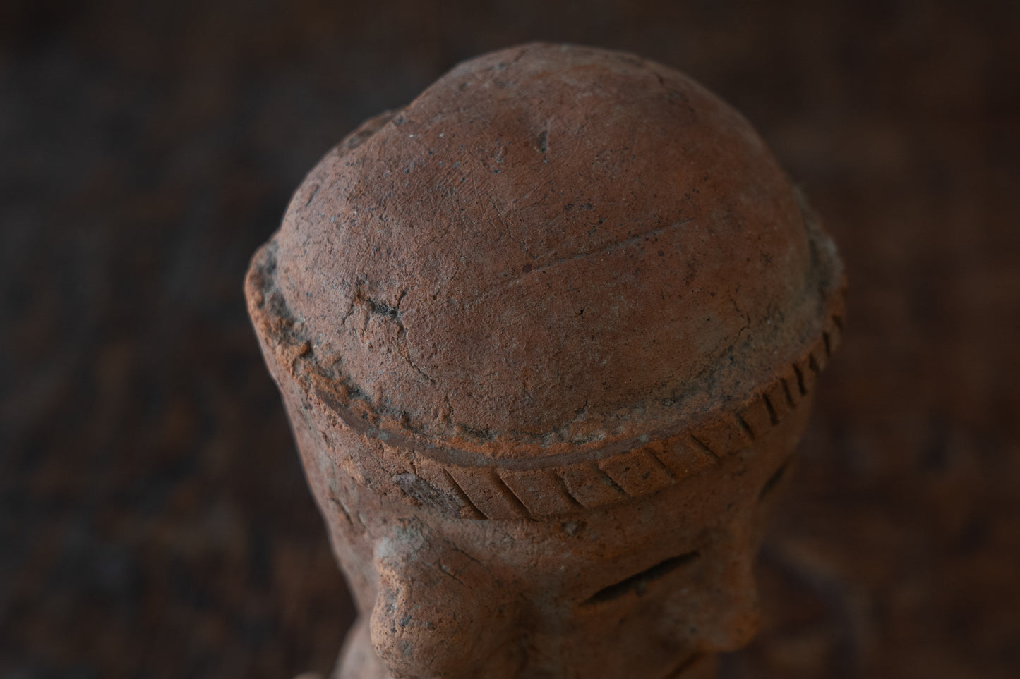 Haniwa male figure wearing a hat