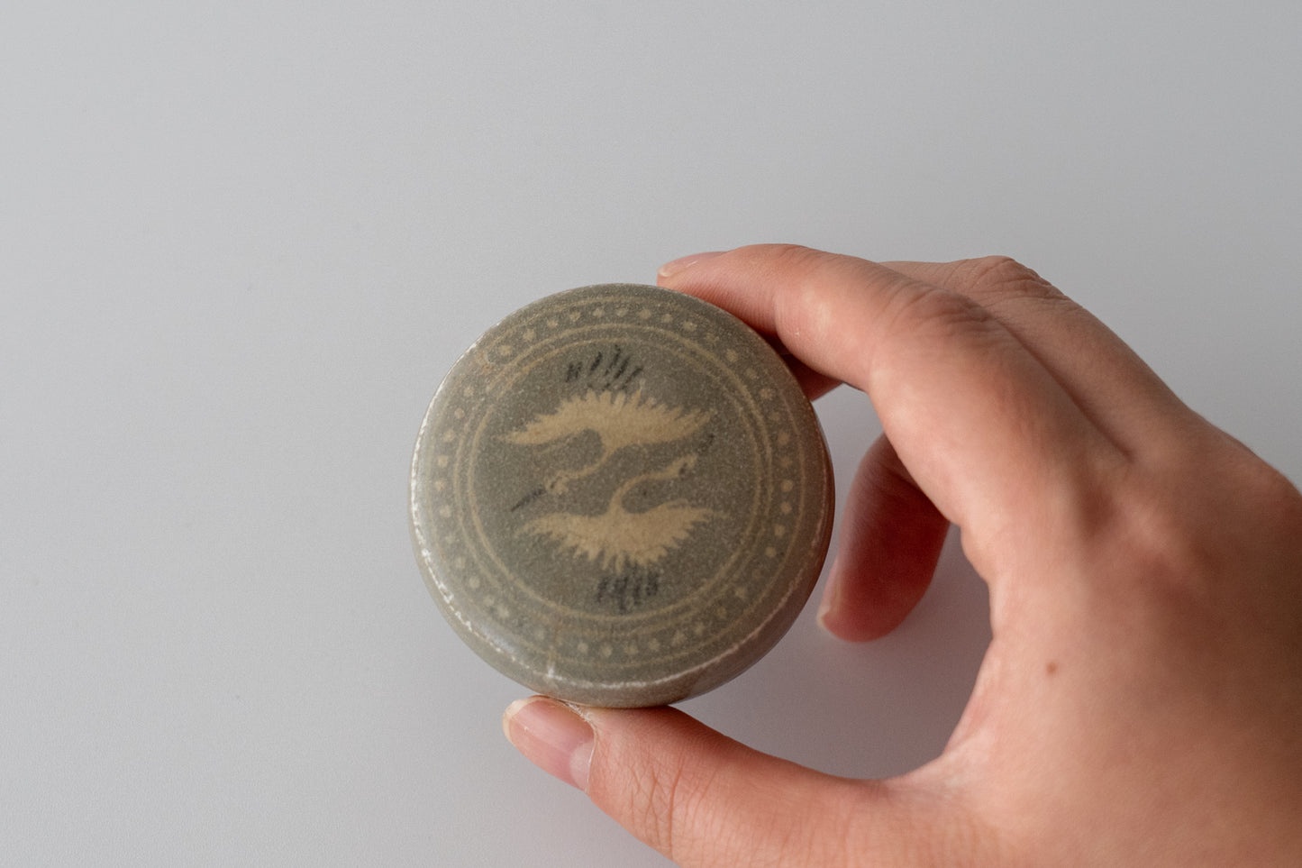 Small covered box, Celadon with inlaid paired cranes design