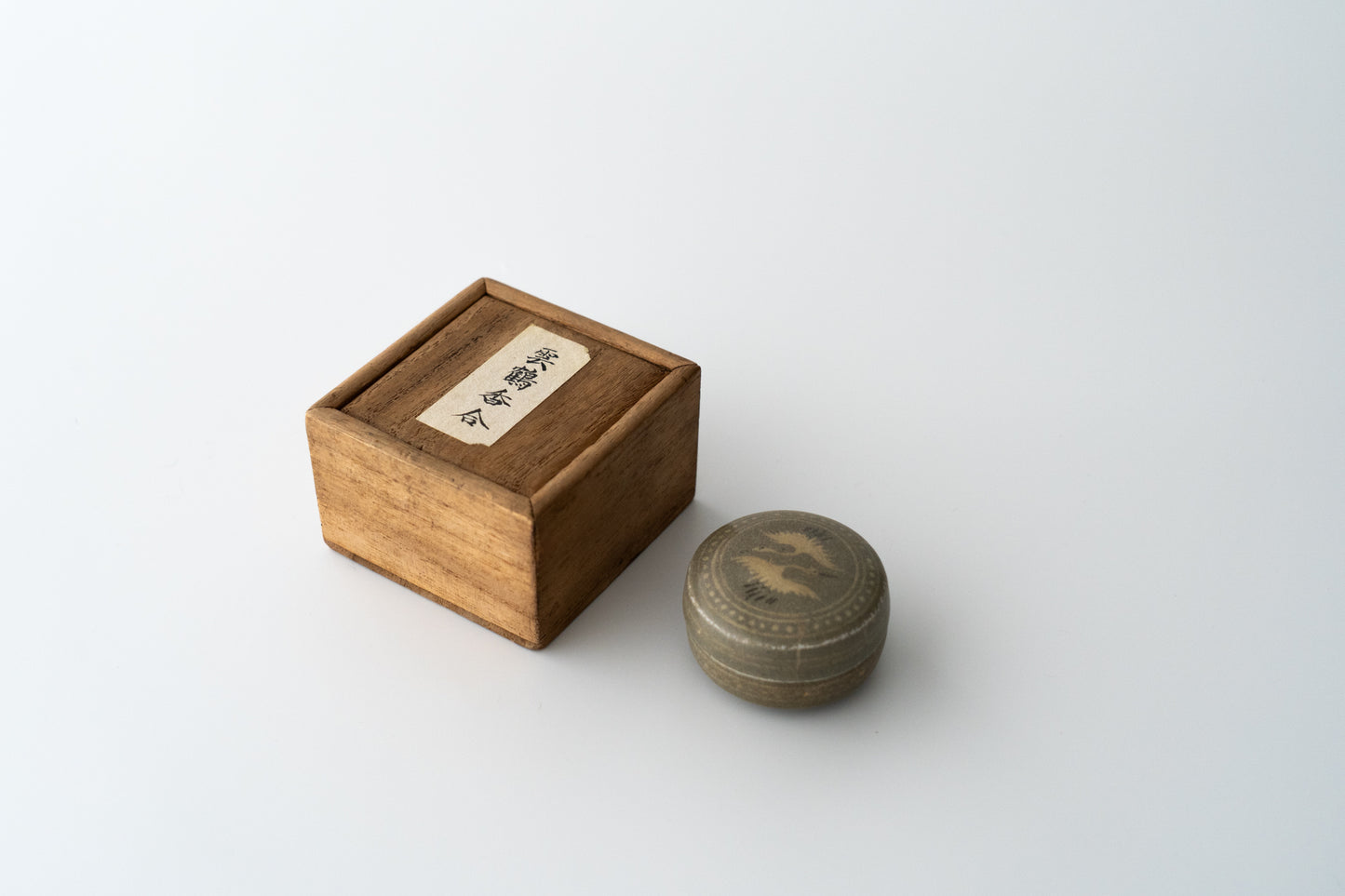 Small covered box, Celadon with inlaid paired cranes design