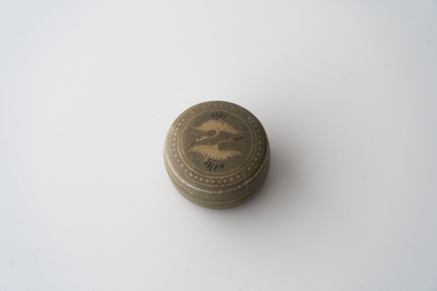 Small covered box, Celadon with inlaid paired cranes design