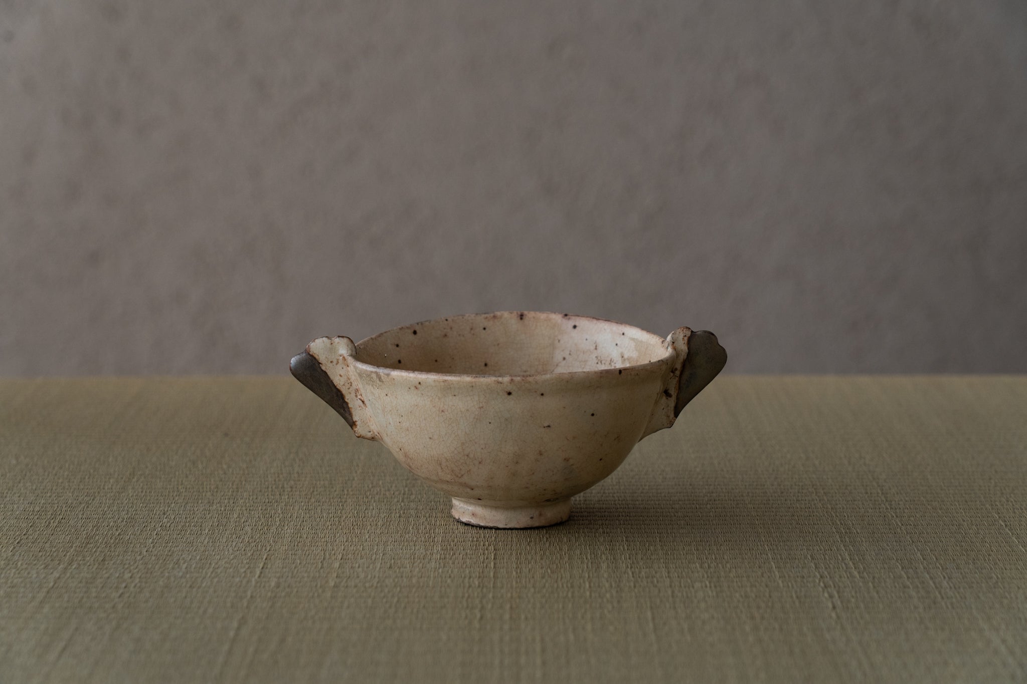 粉引耳付茶碗