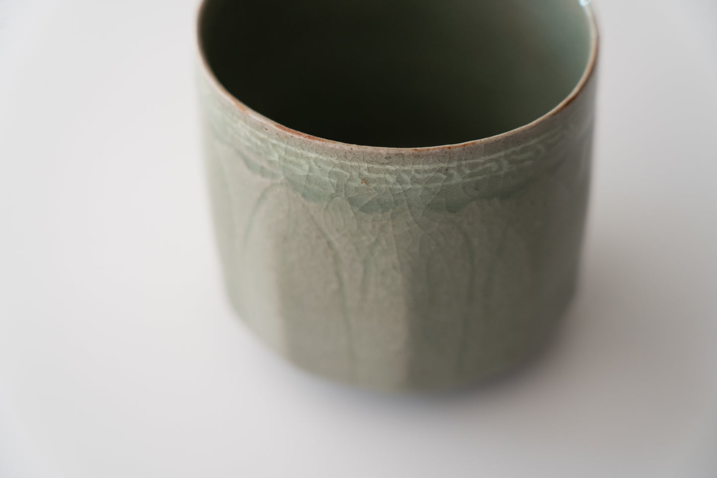 Cylindrical tea bowl with lotus petal design, Celadon