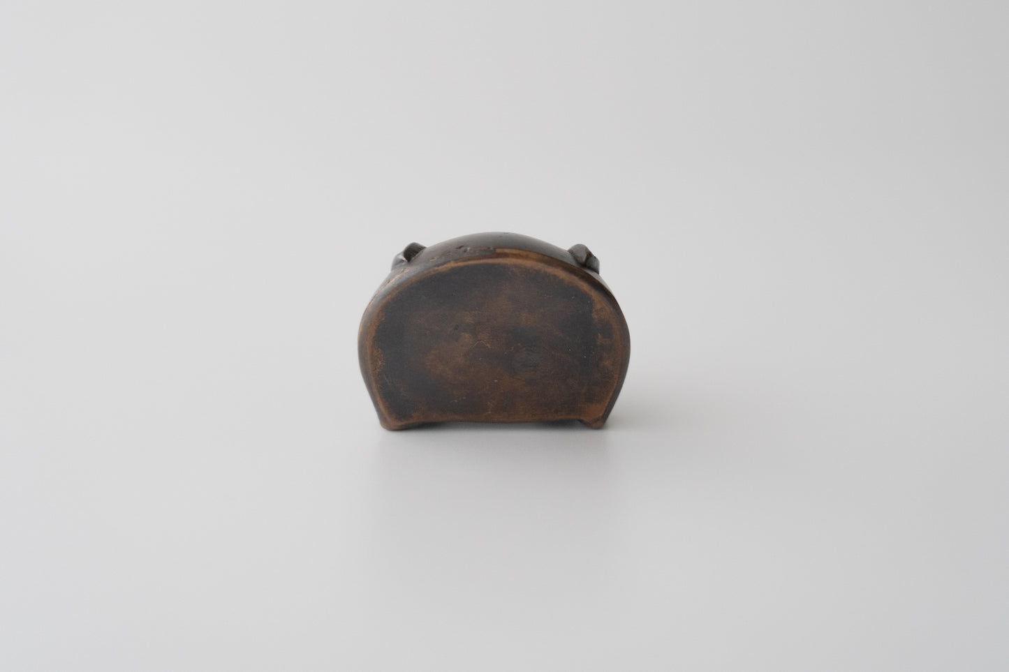 Old bronze water dropper in the shape of a rabbit