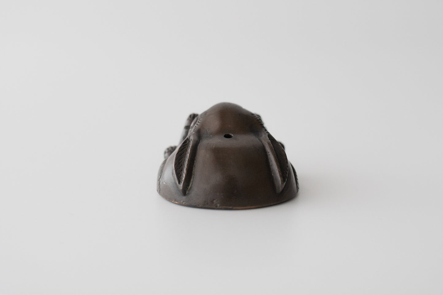 Old bronze water dropper in the shape of a rabbit