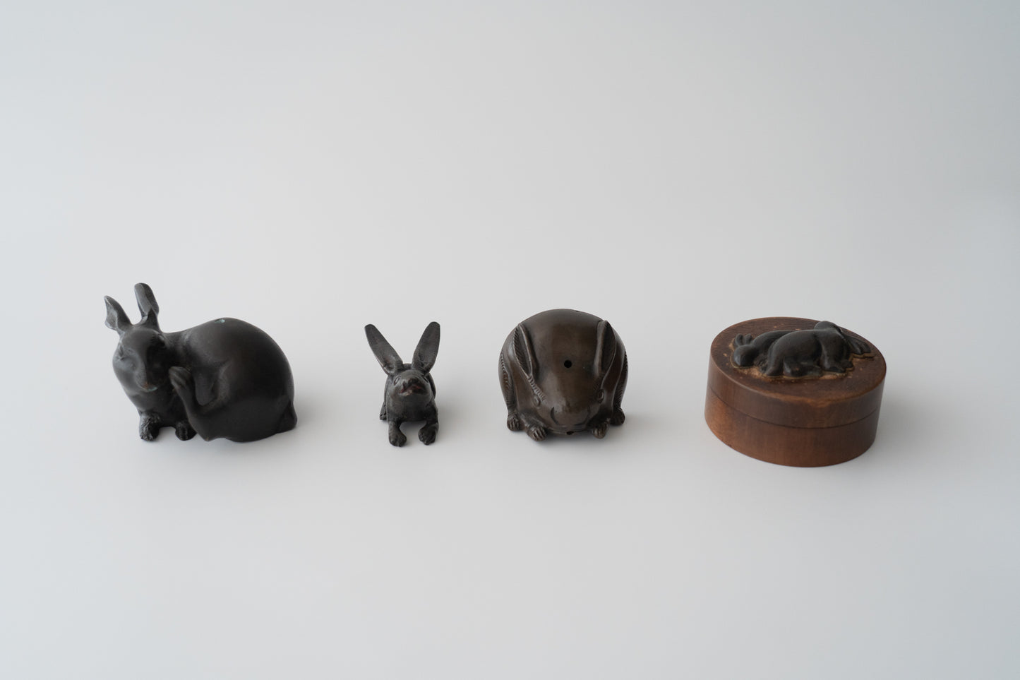 Old bronze water dropper in the shape of a rabbit
