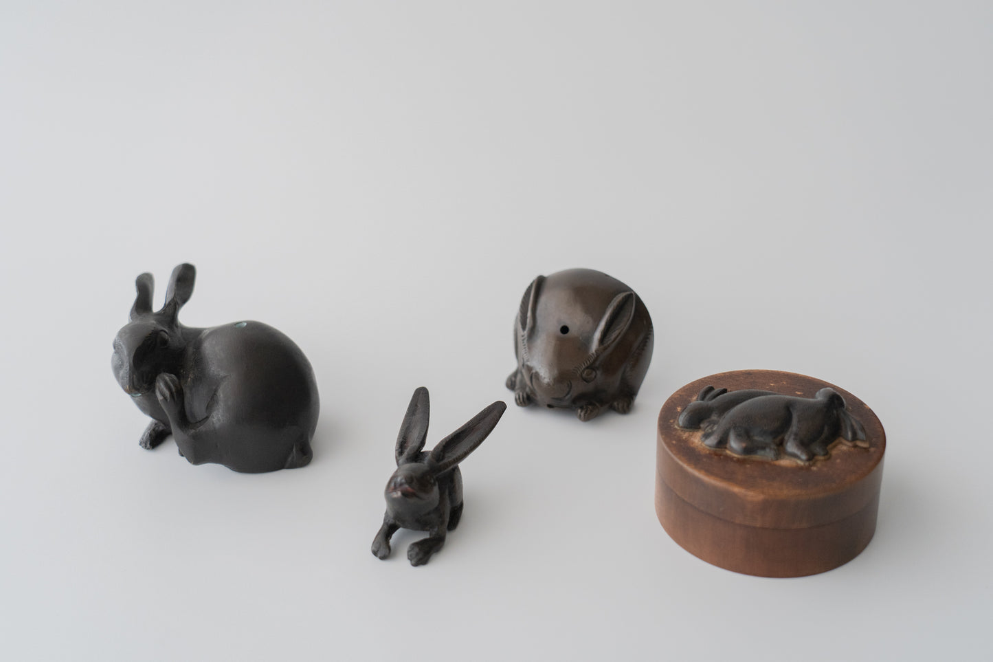 Old bronze water dropper in the shape of a rabbit