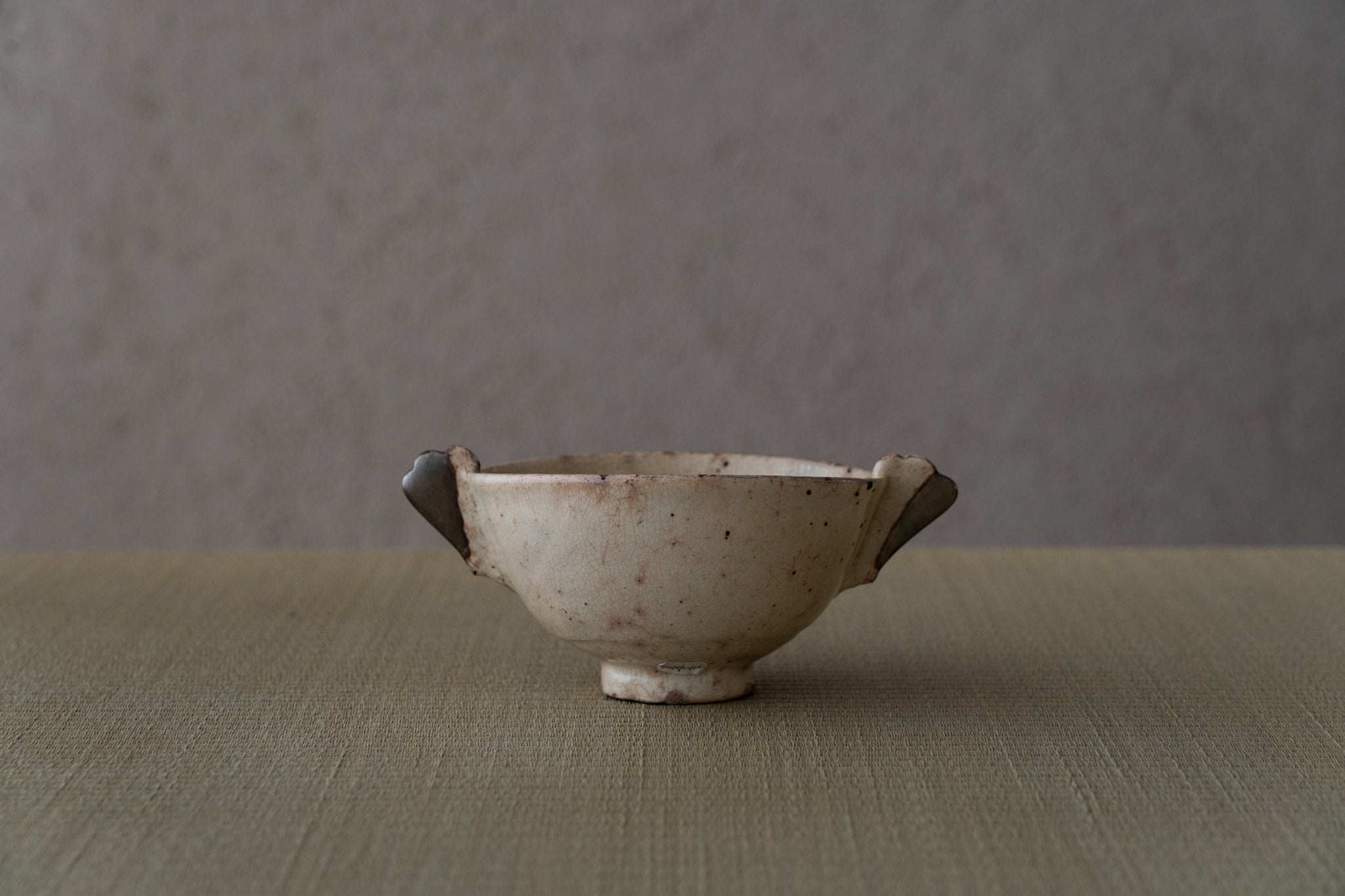 粉引耳付茶碗